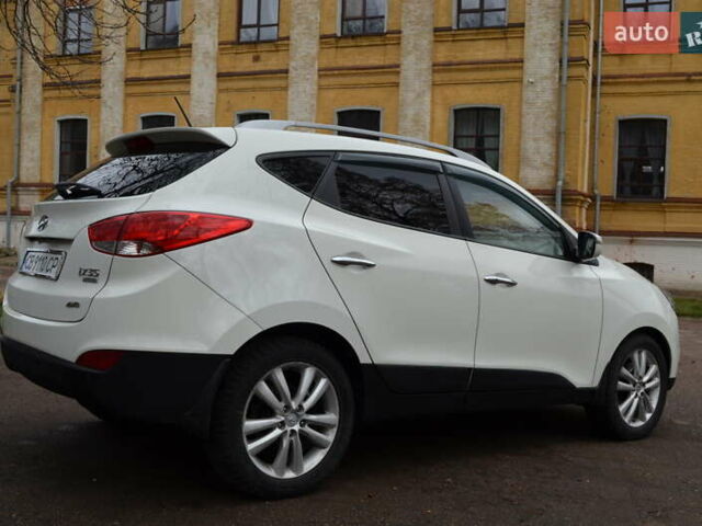 Белый Хендай их35, объемом двигателя 2.36 л и пробегом 202 тыс. км за 11300 $, фото 6 на Automoto.ua