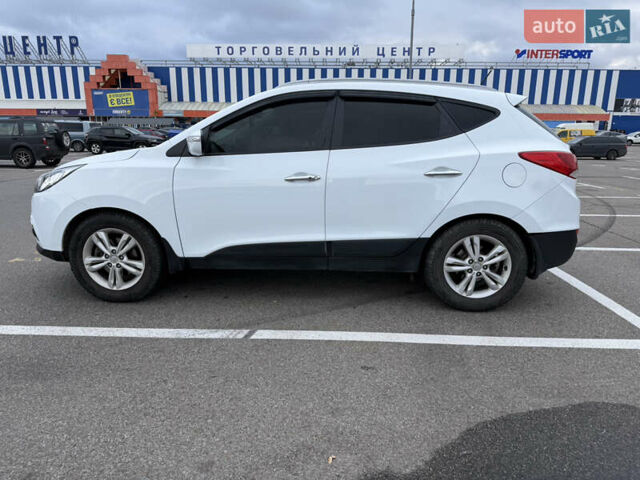 Білий Хендай іх35, об'ємом двигуна 2 л та пробігом 122 тис. км за 11500 $, фото 13 на Automoto.ua