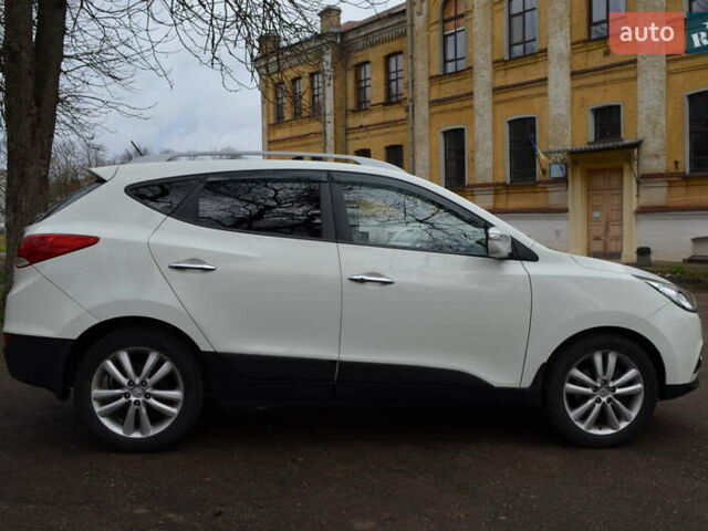 Белый Хендай их35, объемом двигателя 2.36 л и пробегом 202 тыс. км за 11300 $, фото 7 на Automoto.ua