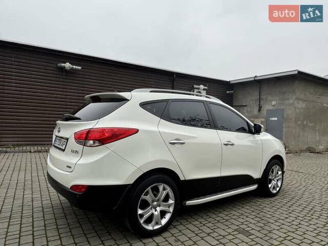 Белый Хендай их35, объемом двигателя 2.36 л и пробегом 111 тыс. км за 11999 $, фото 16 на Automoto.ua