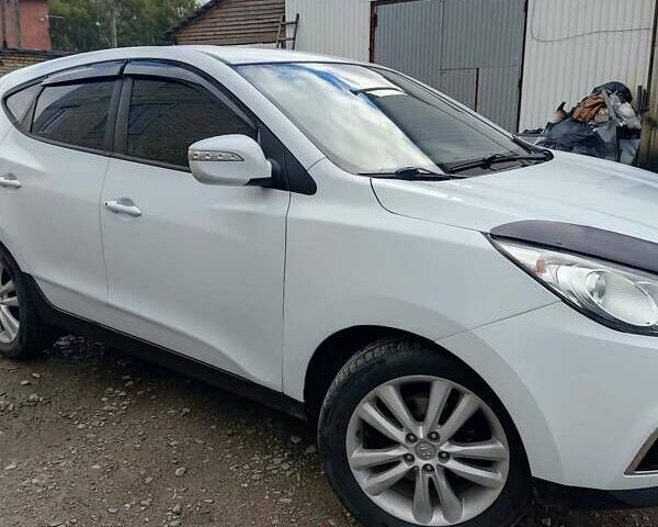 Білий Хендай іх35, об'ємом двигуна 2 л та пробігом 200 тис. км за 10800 $, фото 4 на Automoto.ua