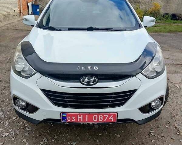 Білий Хендай іх35, об'ємом двигуна 2 л та пробігом 200 тис. км за 10800 $, фото 3 на Automoto.ua
