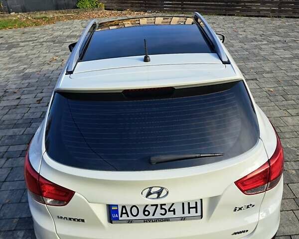 Білий Хендай іх35, об'ємом двигуна 2 л та пробігом 119 тис. км за 12600 $, фото 28 на Automoto.ua