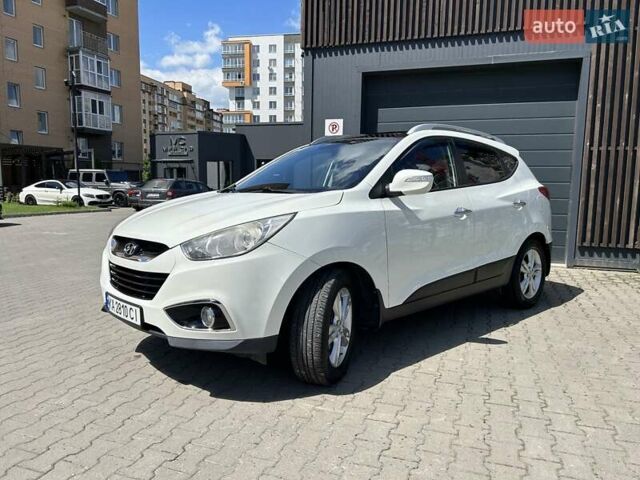 Білий Хендай іх35, об'ємом двигуна 2 л та пробігом 150 тис. км за 13200 $, фото 9 на Automoto.ua
