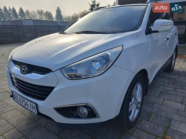 Білий Хендай іх35, об'ємом двигуна 2 л та пробігом 119 тис. км за 12600 $, фото 22 на Automoto.ua
