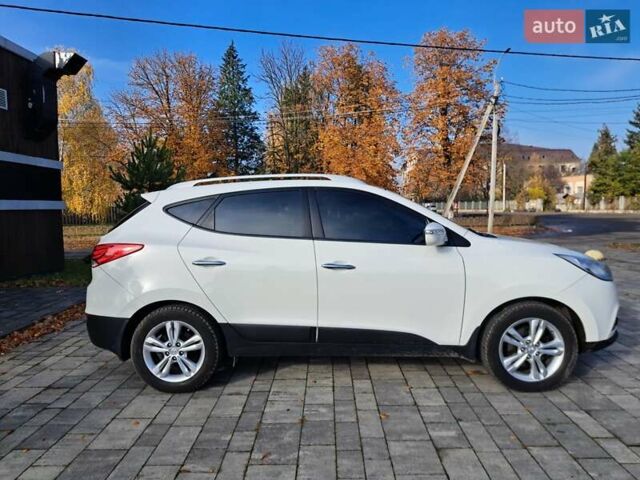 Білий Хендай іх35, об'ємом двигуна 2 л та пробігом 119 тис. км за 12600 $, фото 23 на Automoto.ua