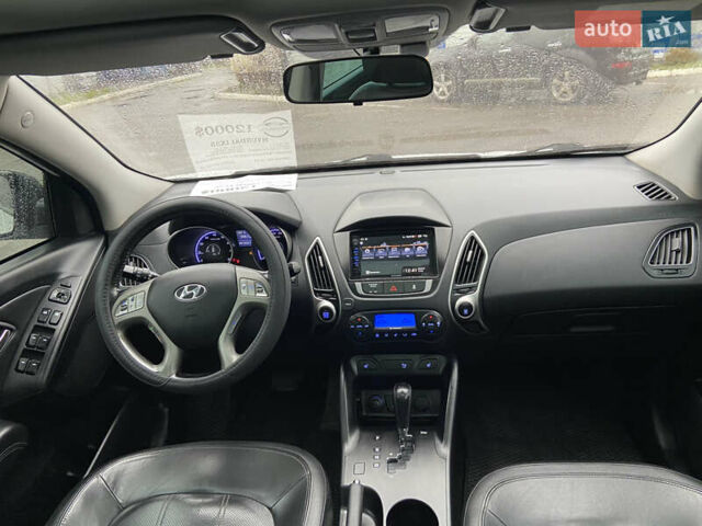 Білий Хендай іх35, об'ємом двигуна 2 л та пробігом 182 тис. км за 11999 $, фото 13 на Automoto.ua