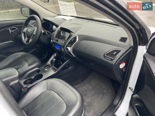 Білий Хендай іх35, об'ємом двигуна 2 л та пробігом 182 тис. км за 11999 $, фото 12 на Automoto.ua