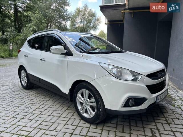 Білий Хендай іх35, об'ємом двигуна 2 л та пробігом 150 тис. км за 13200 $, фото 49 на Automoto.ua