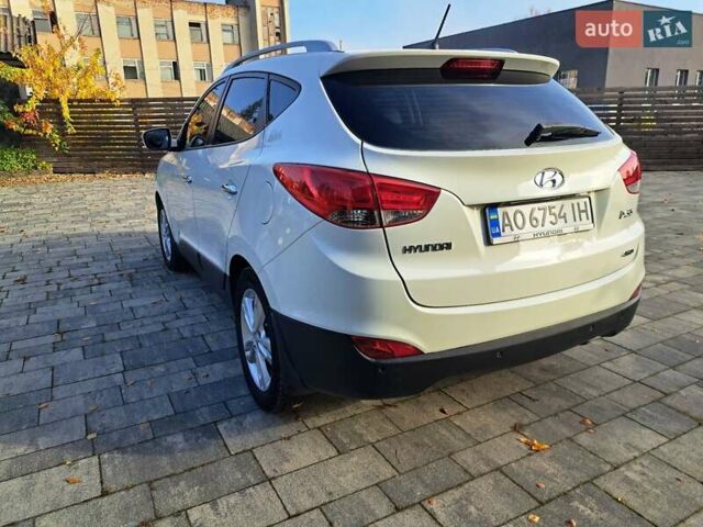 Білий Хендай іх35, об'ємом двигуна 2 л та пробігом 119 тис. км за 12600 $, фото 31 на Automoto.ua