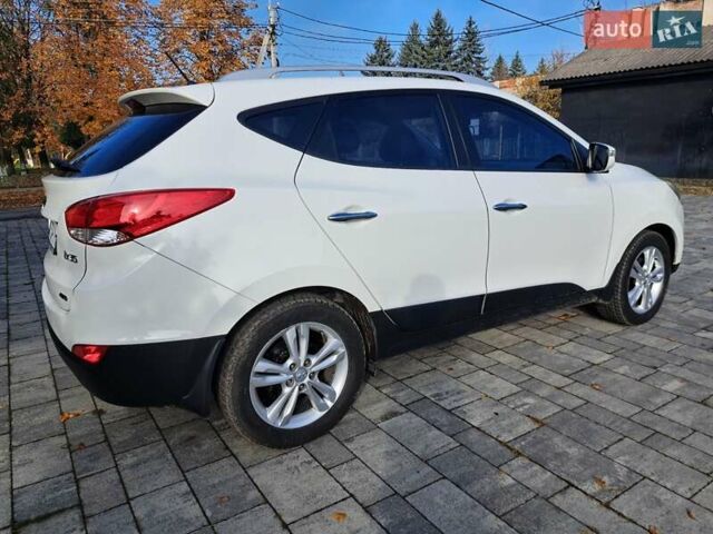 Білий Хендай іх35, об'ємом двигуна 2 л та пробігом 119 тис. км за 12600 $, фото 21 на Automoto.ua