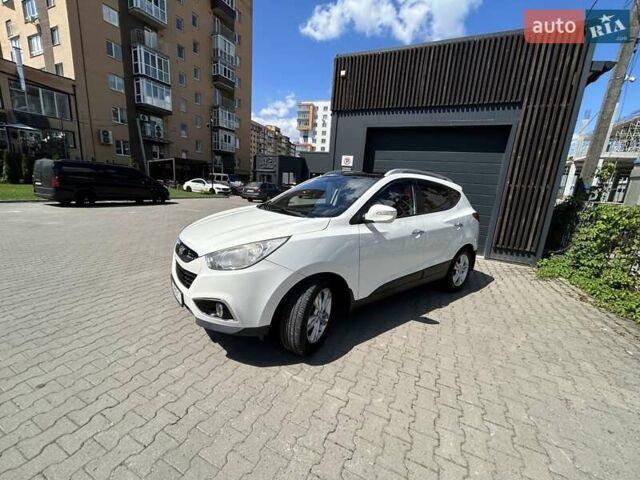 Білий Хендай іх35, об'ємом двигуна 2 л та пробігом 150 тис. км за 13200 $, фото 13 на Automoto.ua