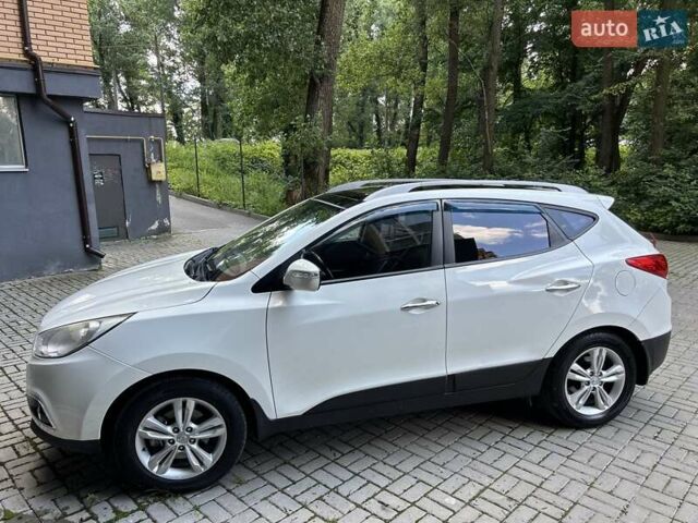 Білий Хендай іх35, об'ємом двигуна 2 л та пробігом 150 тис. км за 13200 $, фото 48 на Automoto.ua