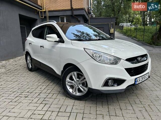 Білий Хендай іх35, об'ємом двигуна 2 л та пробігом 150 тис. км за 13200 $, фото 17 на Automoto.ua