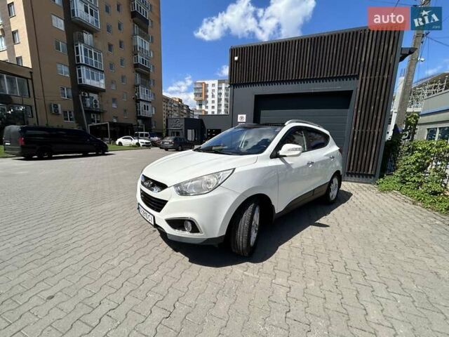 Білий Хендай іх35, об'ємом двигуна 2 л та пробігом 150 тис. км за 13200 $, фото 12 на Automoto.ua