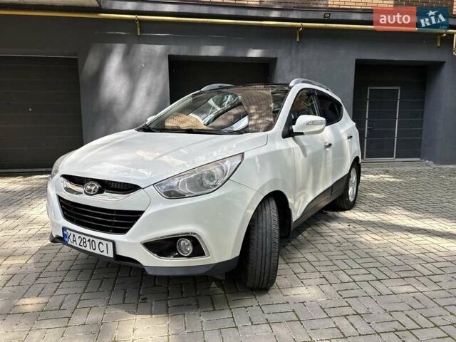 Білий Хендай іх35, об'ємом двигуна 2 л та пробігом 150 тис. км за 13200 $, фото 18 на Automoto.ua