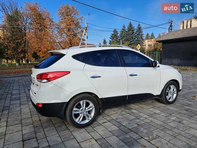 Білий Хендай іх35, об'ємом двигуна 2 л та пробігом 119 тис. км за 12600 $, фото 1 на Automoto.ua