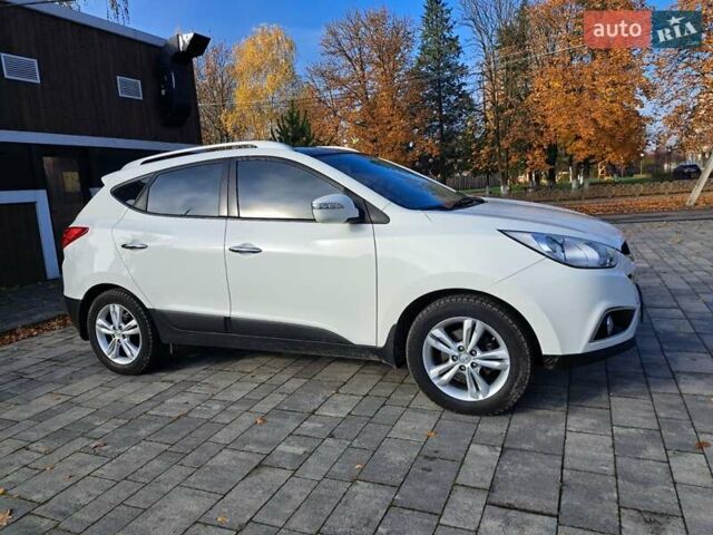 Білий Хендай іх35, об'ємом двигуна 2 л та пробігом 119 тис. км за 12600 $, фото 24 на Automoto.ua