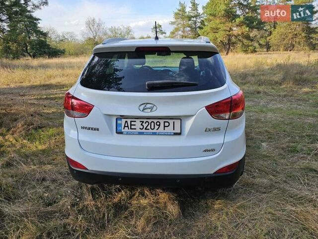 Белый Хендай их35, объемом двигателя 2 л и пробегом 180 тыс. км за 12500 $, фото 34 на Automoto.ua