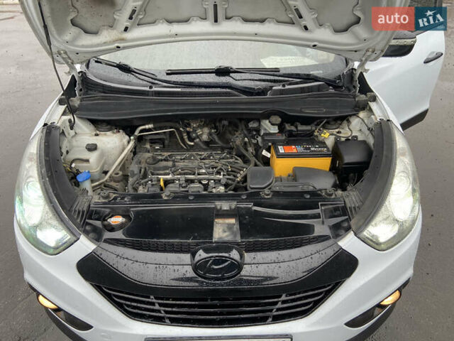 Білий Хендай іх35, об'ємом двигуна 2 л та пробігом 182 тис. км за 11999 $, фото 14 на Automoto.ua