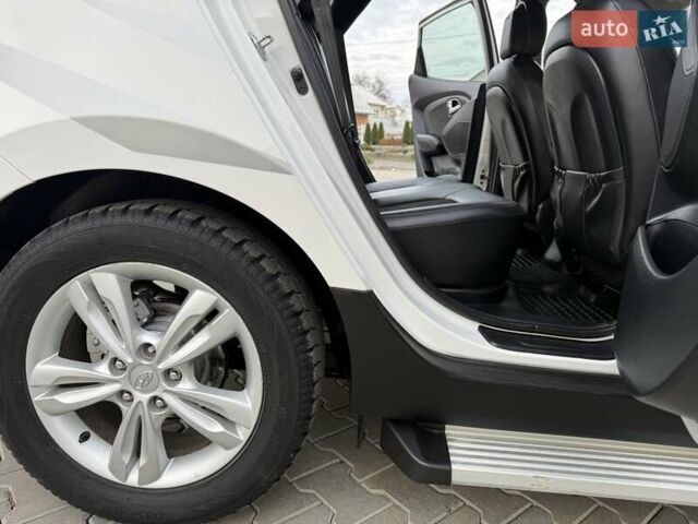 Білий Хендай іх35, об'ємом двигуна 2 л та пробігом 133 тис. км за 9600 $, фото 44 на Automoto.ua
