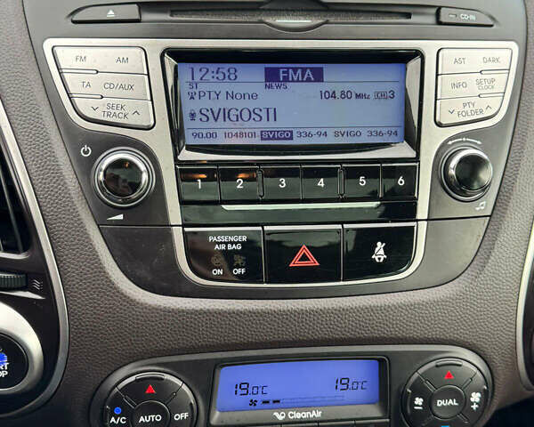 Белый Хендай их35, объемом двигателя 2 л и пробегом 169 тыс. км за 13300 $, фото 24 на Automoto.ua