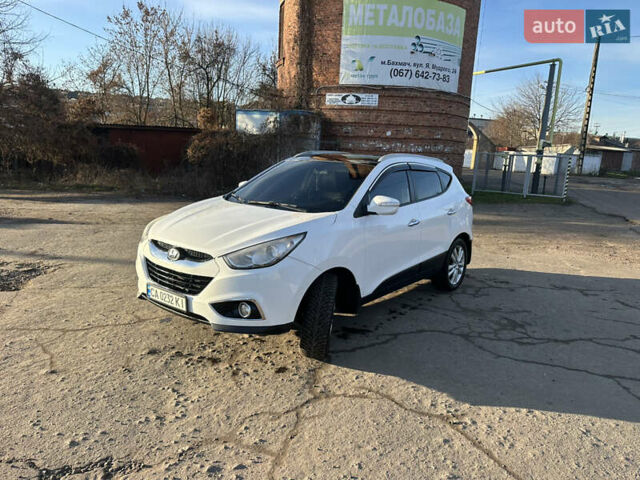 Білий Хендай іх35, об'ємом двигуна 2 л та пробігом 220 тис. км за 12600 $, фото 6 на Automoto.ua