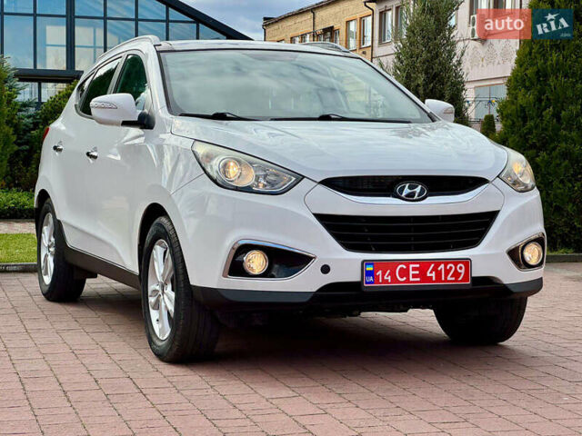 Білий Хендай іх35, об'ємом двигуна 2 л та пробігом 169 тис. км за 13800 $, фото 31 на Automoto.ua