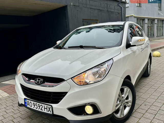 Белый Хендай их35, объемом двигателя 2 л и пробегом 178 тыс. км за 11900 $, фото 6 на Automoto.ua