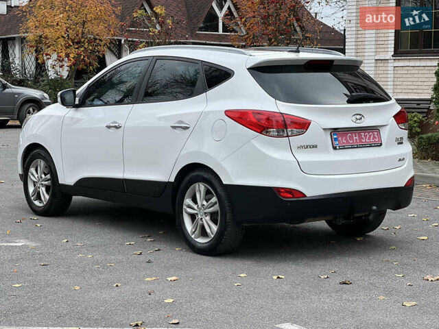 Белый Хендай их35, объемом двигателя 2 л и пробегом 172 тыс. км за 14900 $, фото 6 на Automoto.ua
