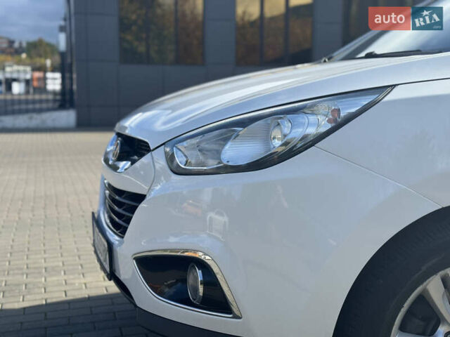 Білий Хендай іх35, об'ємом двигуна 1.69 л та пробігом 248 тис. км за 11450 $, фото 13 на Automoto.ua