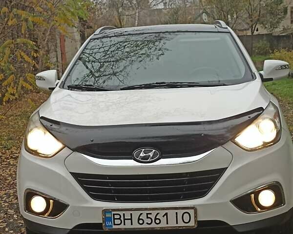 Белый Хендай их35, объемом двигателя 2 л и пробегом 90 тыс. км за 13888 $, фото 7 на Automoto.ua