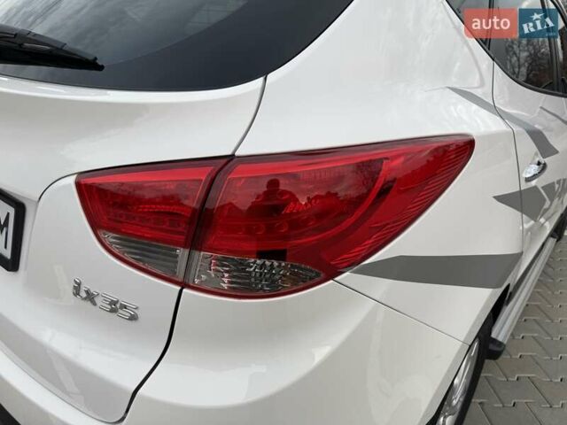 Білий Хендай іх35, об'ємом двигуна 2 л та пробігом 133 тис. км за 9600 $, фото 17 на Automoto.ua