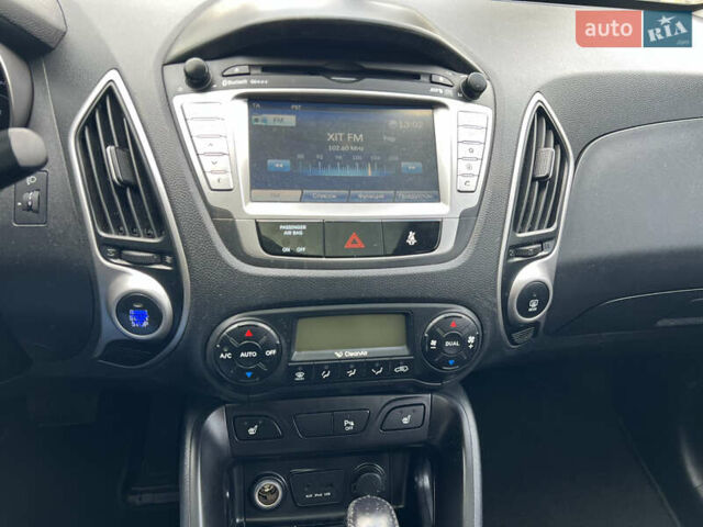 Белый Хендай их35, объемом двигателя 2 л и пробегом 172 тыс. км за 14900 $, фото 22 на Automoto.ua