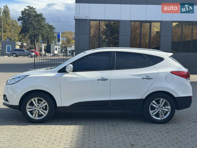 Білий Хендай іх35, об'ємом двигуна 1.69 л та пробігом 248 тис. км за 11450 $, фото 12 на Automoto.ua