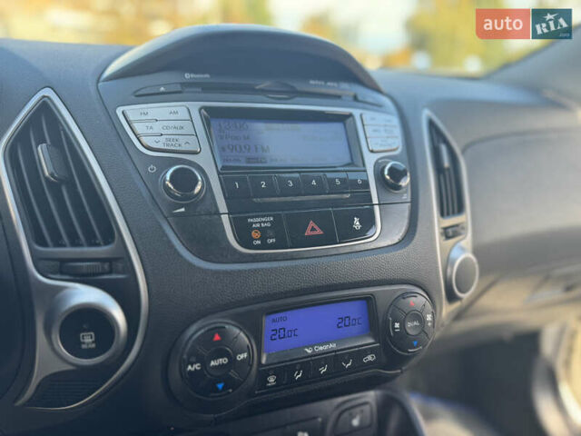 Білий Хендай іх35, об'ємом двигуна 1.69 л та пробігом 248 тис. км за 11450 $, фото 27 на Automoto.ua