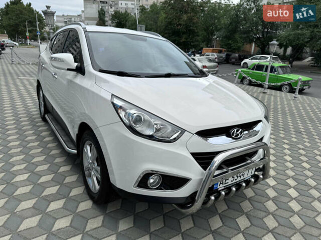 Білий Хендай іх35, об'ємом двигуна 2 л та пробігом 101 тис. км за 14300 $, фото 30 на Automoto.ua