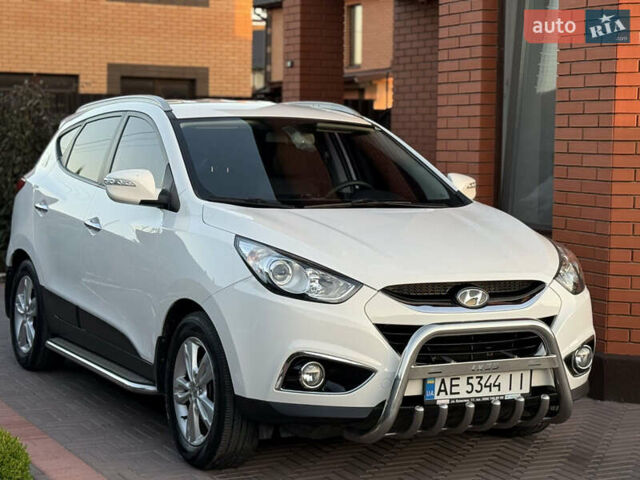 Білий Хендай іх35, об'ємом двигуна 2 л та пробігом 101 тис. км за 13800 $, фото 6 на Automoto.ua