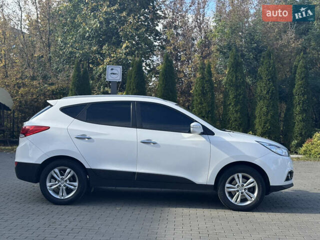 Білий Хендай іх35, об'ємом двигуна 1.69 л та пробігом 248 тис. км за 11450 $, фото 6 на Automoto.ua