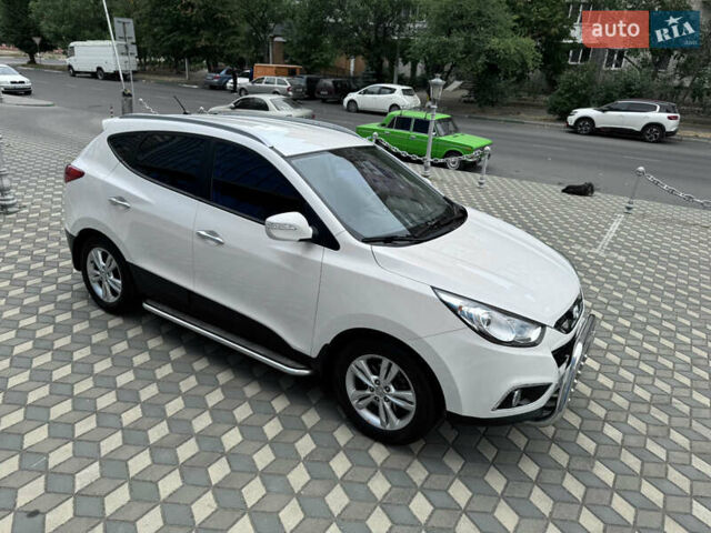Білий Хендай іх35, об'ємом двигуна 2 л та пробігом 101 тис. км за 14300 $, фото 26 на Automoto.ua