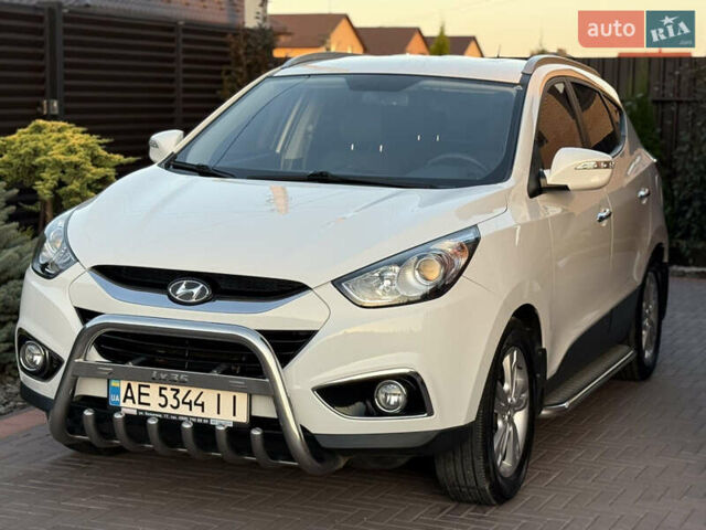 Білий Хендай іх35, об'ємом двигуна 2 л та пробігом 101 тис. км за 13800 $, фото 14 на Automoto.ua