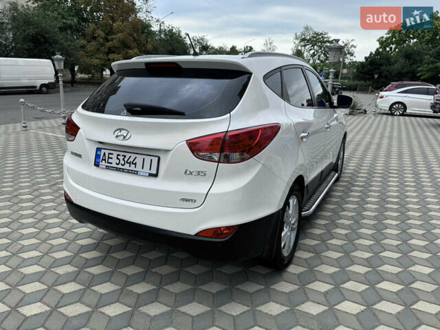 Білий Хендай іх35, об'ємом двигуна 2 л та пробігом 101 тис. км за 14300 $, фото 17 на Automoto.ua