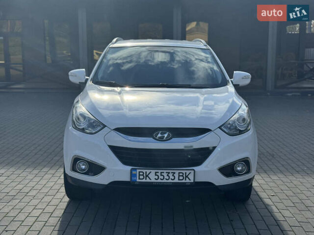 Білий Хендай іх35, об'ємом двигуна 1.69 л та пробігом 248 тис. км за 11450 $, фото 2 на Automoto.ua