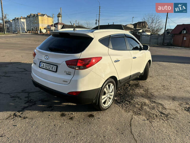 Білий Хендай іх35, об'ємом двигуна 2 л та пробігом 220 тис. км за 12600 $, фото 4 на Automoto.ua