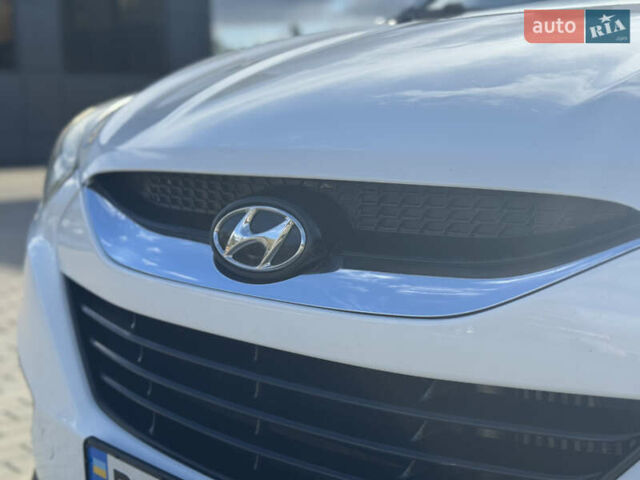 Білий Хендай іх35, об'ємом двигуна 1.69 л та пробігом 248 тис. км за 11450 $, фото 14 на Automoto.ua