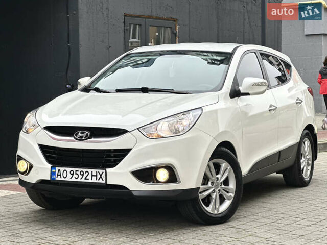 Белый Хендай их35, объемом двигателя 2 л и пробегом 178 тыс. км за 11900 $, фото 14 на Automoto.ua