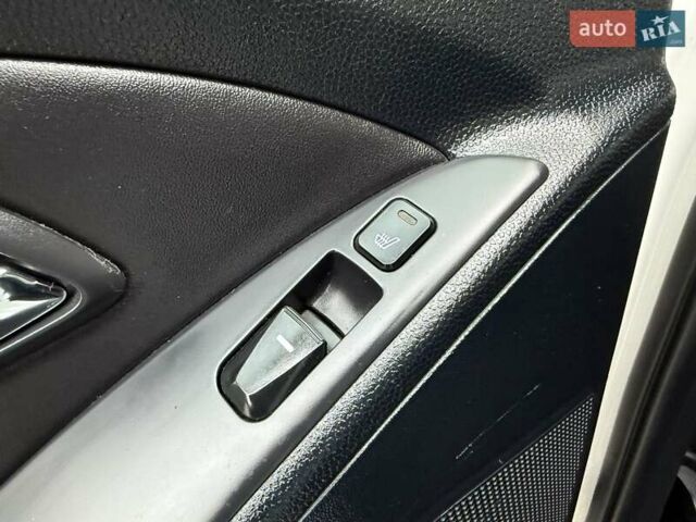 Білий Хендай іх35, об'ємом двигуна 2 л та пробігом 133 тис. км за 9600 $, фото 66 на Automoto.ua