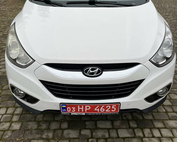 Білий Хендай іх35, об'ємом двигуна 2 л та пробігом 202 тис. км за 13500 $, фото 4 на Automoto.ua