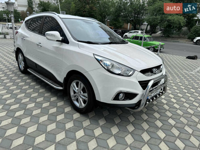 Білий Хендай іх35, об'ємом двигуна 2 л та пробігом 101 тис. км за 14300 $, фото 27 на Automoto.ua
