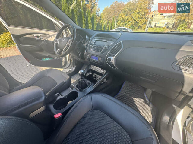 Білий Хендай іх35, об'ємом двигуна 1.69 л та пробігом 248 тис. км за 11450 $, фото 33 на Automoto.ua